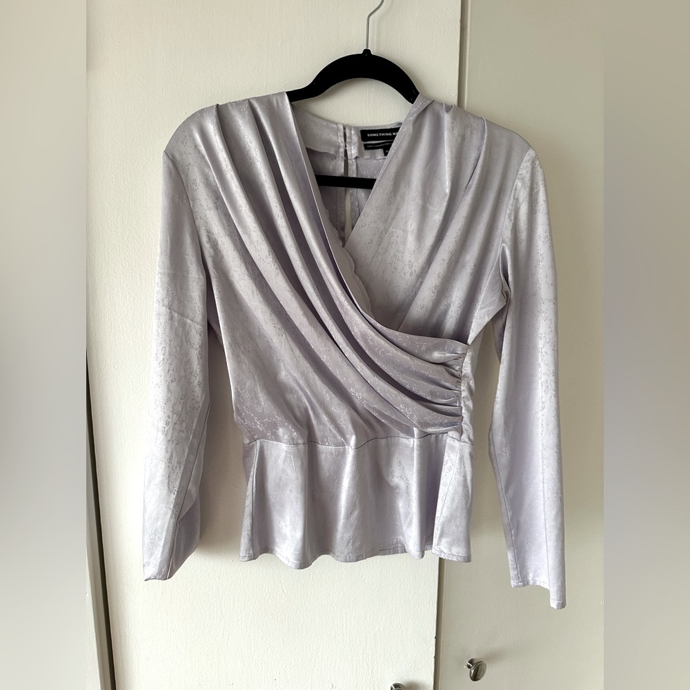Brand new blouse for women’s. Small size. Brand is something navy